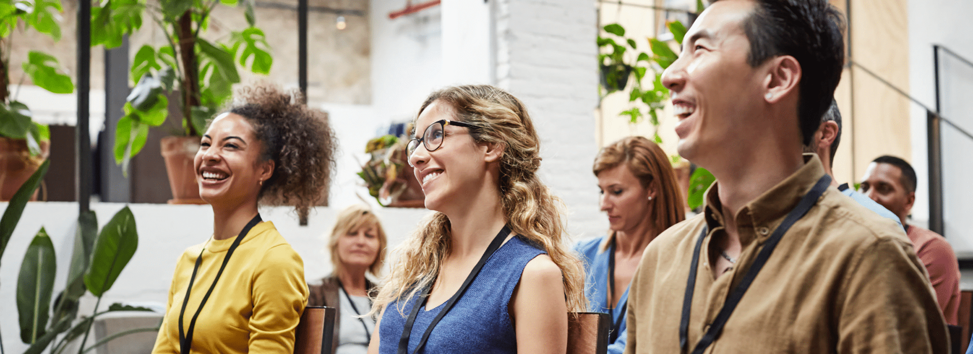 Group of new employees smiling during an orientation session at the University of Ottawa
